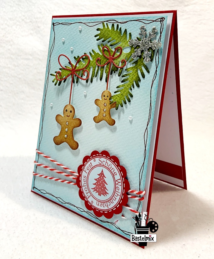 Weihnachtskarte mit Lebkuchenmännern und Distress Inks Hintergrund